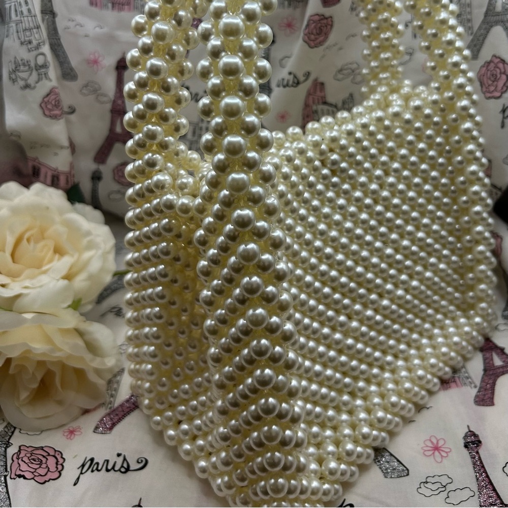 Vintage Pearl Tote. Off White color. Not pure white. Lots of room on inside.